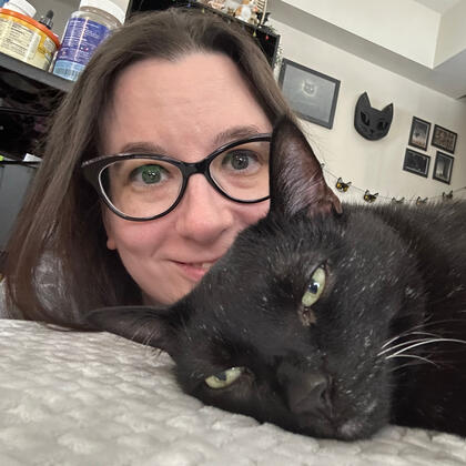 Photo of Nikki Hess and Manny Halloween Cat